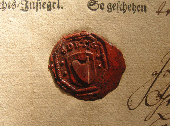Herb i pieczęć Racławic Śląskich